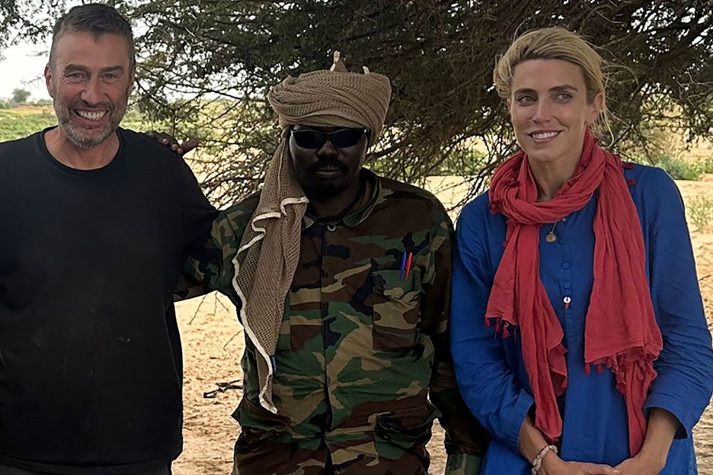 CNN's Clarissa Ward with her cameraman Scott McWhinnie and one of their captors after they were told they would be released.